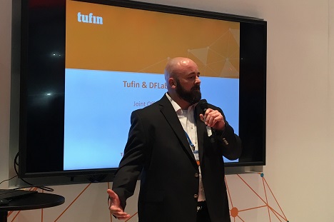 Speaker presenting Tufin and DFLabs joint offering